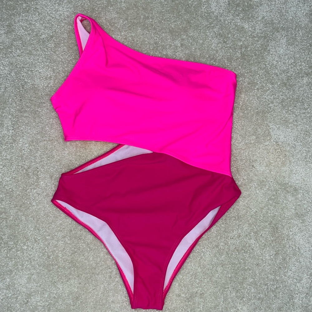 Swimsuit - one strap with opening at waist.